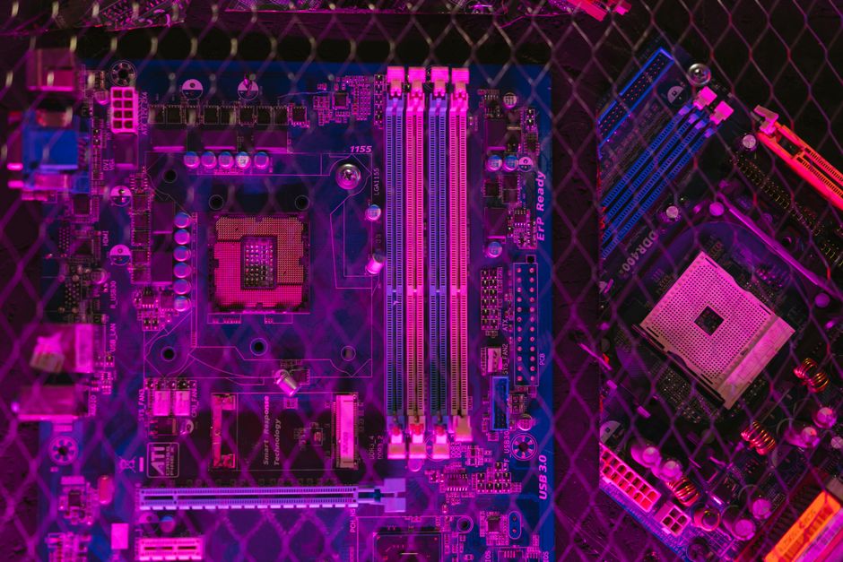 Close-up of a modern circuit board with glowing blue pathways, symbolizing the structured data and technical connections f...